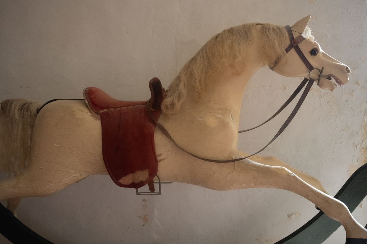 A vintage wooden rocking horse